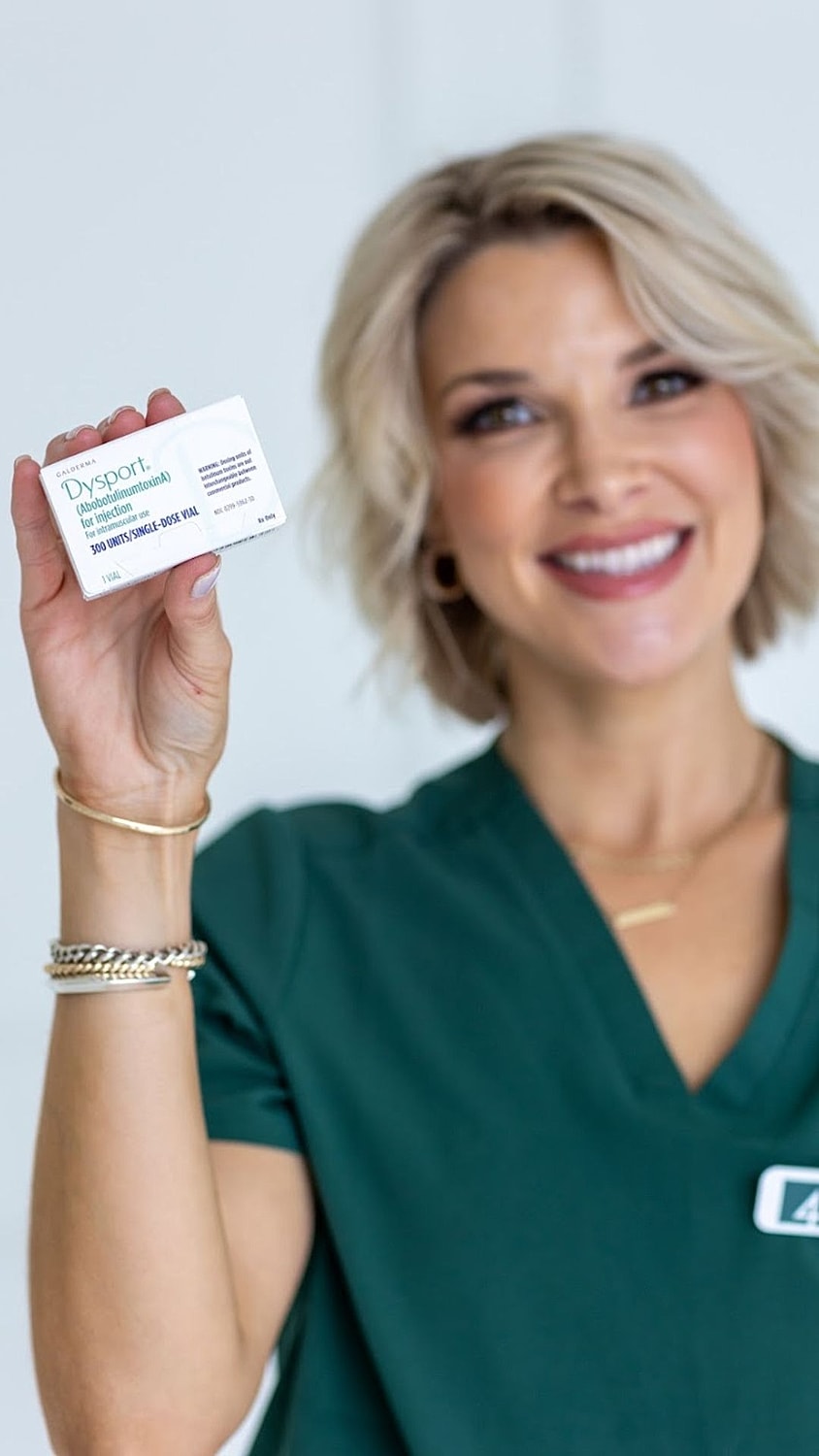 Profile portrait of a smiling woman.