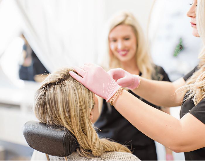 Hair treatment at a beauty salon.