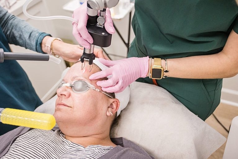 Skincare treatment session in progress. Patient relaxed.