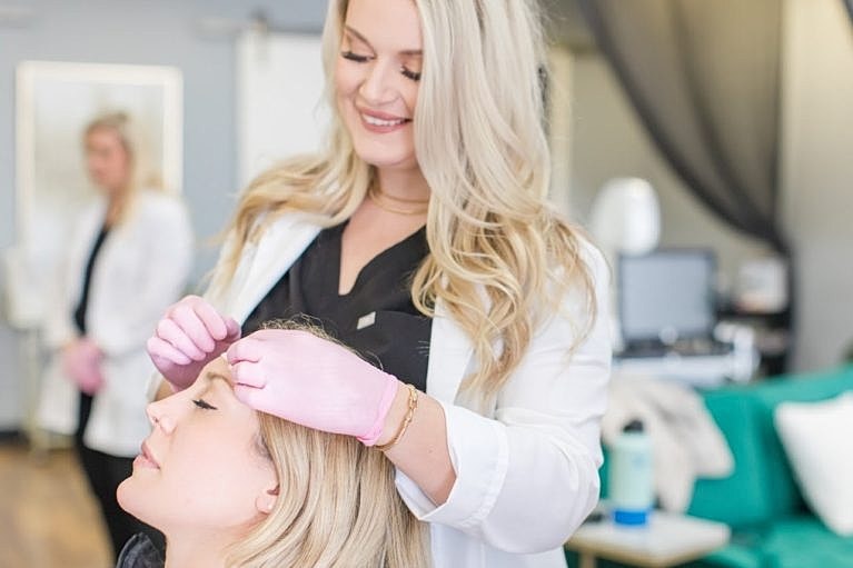 Beauty treatment in a modern salon setting.