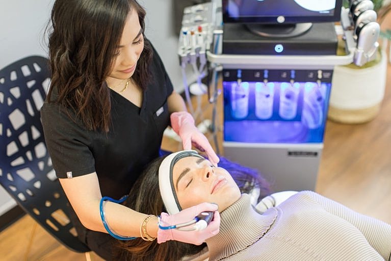 Skincare treatment session in a professional setting.